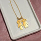 "Personalized Engraved Kids Charmed Necklace: Custom Child-Shaped Pendants with Names"